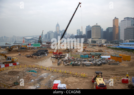 Lavori in corso su terreni bonificati in Victoria Harbour per il distretto centrale dell'isola di Hong kong RAS di Hong kong cina asia Foto Stock