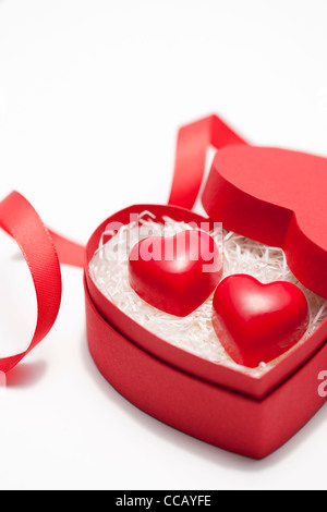 A forma di cuore ad cioccolatini in confezione regalo Foto Stock