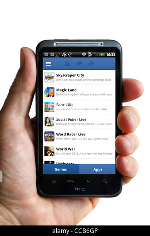 I giochi di Facebook pagina su uno smartphone HTC Foto Stock