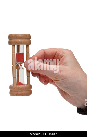 Eine Sanduhr wird in der gehalten mano | una clessidra è tenuto in mano Foto Stock