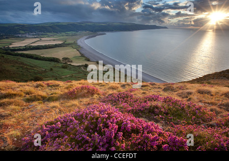Tramonto sulla baia di Porlock da Bossington Hill, Parco Nazionale di Exmoor, Somerset, Inghilterra, Regno Unito Foto Stock