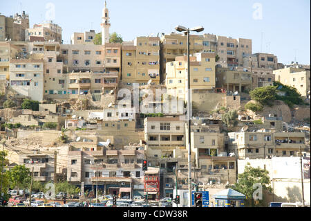 Giugno 25, 2011 - Amman in Giordania - Giugno 25, 2011, Amman, Giordania - La comunità di Misdar è di circa il 4%, cristiana e la vita di tanti cristiani in Giordania e in tutto il Medio Oriente è sempre più difficile man mano che diventano più e più della classe di minoranza. I volontari della Caritas Programma, supportato dall'inter Foto Stock