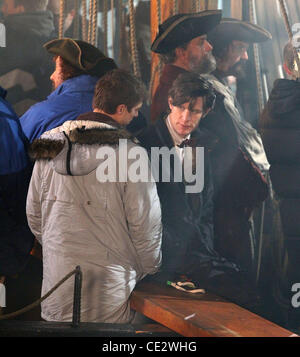 Matt Smith le riprese di una scena sul set di un film di 'Dr che' le riprese in location in Cornovaglia Cornwall Inghilterra - 02.02.11 Foto Stock