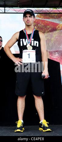Joe Jonas Joe Jonas iWin 5K Fun Run/a piedi, beneficiando delle Olimpiadi Speciali in Florida per il campus principale della Nova Southeastern University Davie, Florida - 06.09.10 Foto Stock