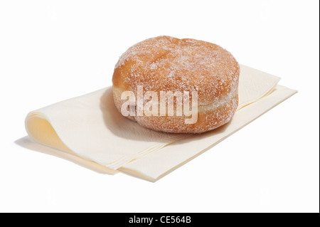 Una jam donut su un tovagliolo Foto Stock