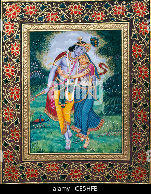 Radha Krishna danza nel giardino in rilievo in oro mount di confine la pittura in miniatura su carta Foto Stock