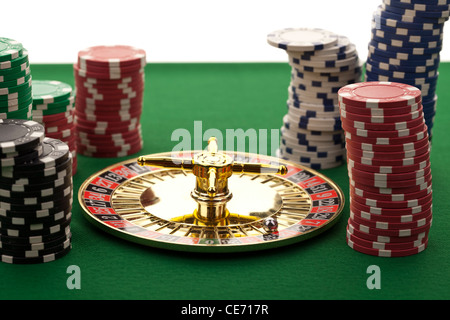 Bella roulette oro su sfondo verde. Foto Stock