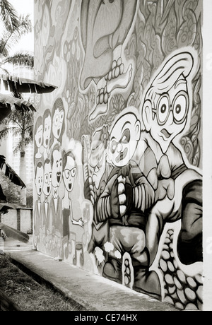 Urban graffiti street art in Chinatown di Singapore in Estremo Oriente Asia sud-orientale. Personaggio dei fumetti Travel Foto Stock