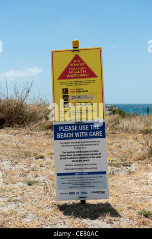 Informazioni segnali di avvertimento di inquinamento sulla spiaggia da Rena Foto Stock