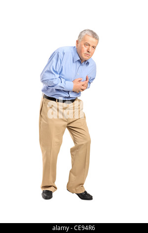 Senior uomo avente un attacco di cuore Foto Stock