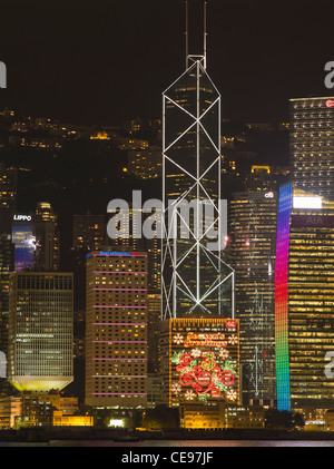 Dh Bank of China Tower PORTO DI HONG KONG HONG KONG edifici di notte le luci di Natale la costruzione di città di scena Foto Stock