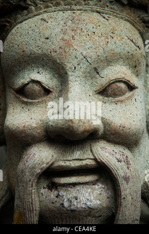 Cinese di pietra custode statua, Wat Po Tempio Phra Nakhon district, Bangkok, Thailandia. Foto Stock