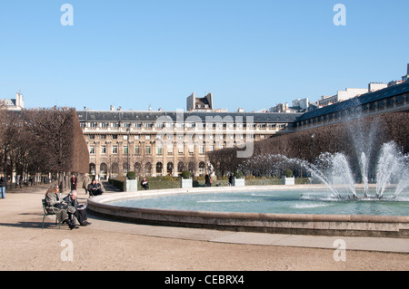 Fountain and garden of the Palais Royal Paris France French Foto Stock
