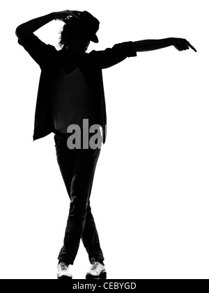 Lunghezza completa silhouette di un giovane ballerino di danza funky hip hop r&b su studio isolato sfondo bianco Foto Stock