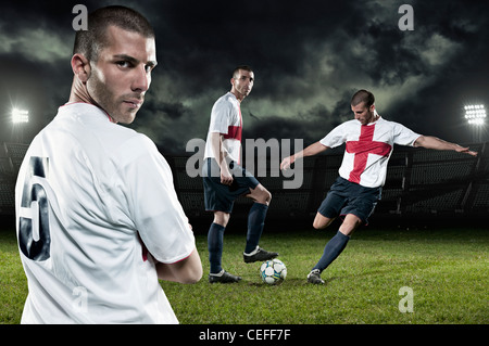 Esposizione multipla di giocatore di calcio Foto Stock