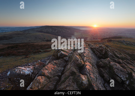 Sunrise over Mendip Hills da Crook picco. Somerset. In Inghilterra. Regno Unito. Foto Stock