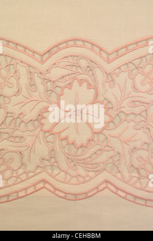 In lino naturale di sfondo in tessuto con ricami Foto Stock