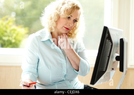 Donna sul lavoro Foto Stock