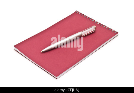 Notebook con penna argento, isolato su bianco Foto Stock