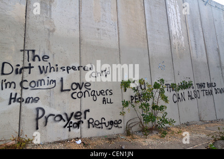 Graffiti sul muro di sicurezza costruito per separare ebrei ed arabi settori di Israele Foto Stock