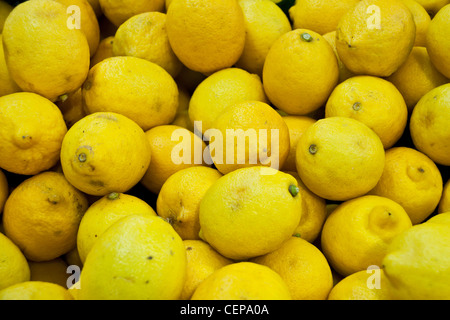 Limoni sfondo raw Foto Stock