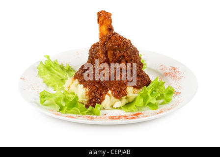 Fuso a snodo di vitello al forno con patate pestate Foto Stock