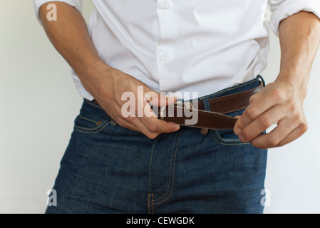 L'uomo della cinghia di fissaggio, metà sezione Foto Stock