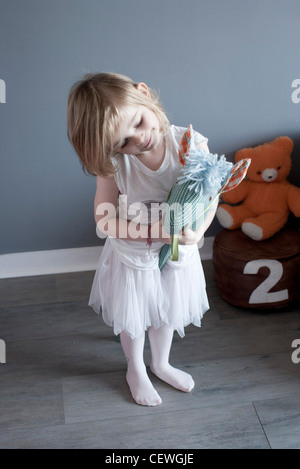 Bambina gioca con cavallo hobby Foto Stock