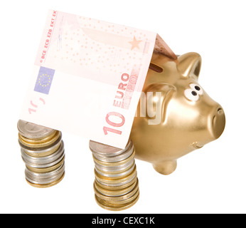 Un golden moneybank sotto le monete banconote ant house Foto Stock