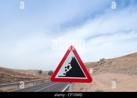 Le rocce che cadono segno di avvertimento Foto Stock