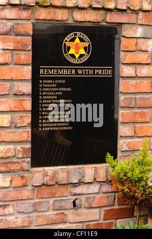 Una lapide commemorativa a Mano rossa Commandos Foto Stock