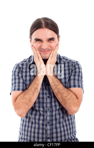 Ritratto di felice giovane grimace, isolato su sfondo bianco. Foto Stock