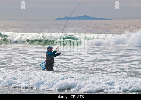 pescatore di spiaggia Foto Stock