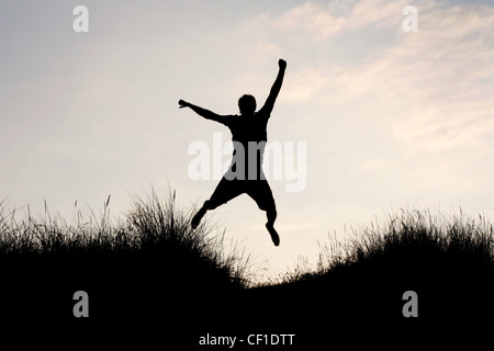 Un uomo godendo di successo Foto Stock