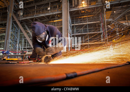 Fresa in acciaio durante il lavoro in cantiere Foto Stock