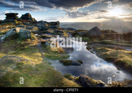Tramonto a 'Over Owler' Tor nel Derbyshire Gran Bretagna Foto Stock