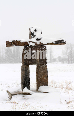 Inuksuit; la figura di pietra significato di agire nella capacità di un essere umano Foto Stock