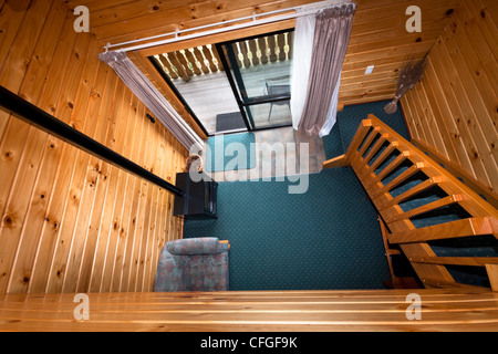 Appartamento Lodge e interni in legno dettaglio. Fox Glacier Lodge, Fox Glacier, Costa Ovest, South Island, in Nuova Zelanda. Foto Stock