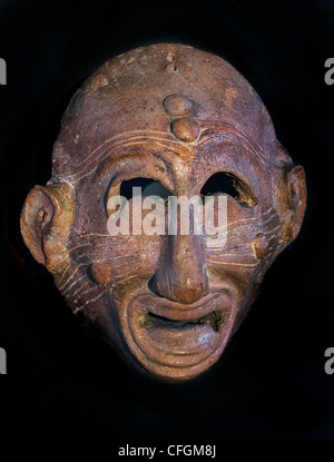 Smorfie maschera apotropaica ( via sfortuna ), IN TERRACOTTA FINE 7 - VI secolo A.C. Cartagine Tunisia Foto Stock