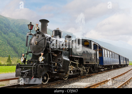 Vintage black Steam powered convoglio ferroviario Foto Stock