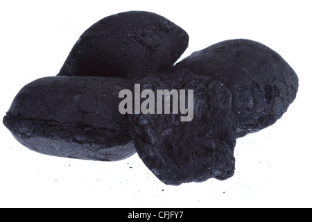 Il carbone, carbonio nugget isolati su sfondo bianco Foto Stock