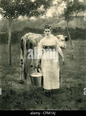 La moglie di un agricoltore portando a casa il Secchio di Latte Foto Stock