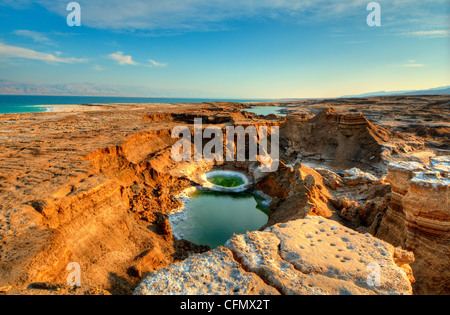 Fori di pozzo vicino al Mar Morto in Ein Gedi, Israele. Foto Stock