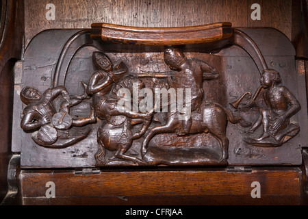 Regno Unito, Inghilterra, Worcestershire, cattedrale di Worcester Cudiero, misericord medievale mostra cavalieri a cavallo di battaglia Foto Stock