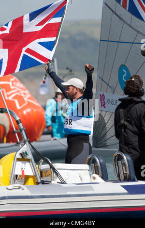 05.08.2012. Weymouth, Inghilterra. Giochi olimpici di vela a Weymouth Dorset, Agosto 2012. Tripla medaglia d'oro olimpica Ben Ainslie vince l'oro nella classe Finn. Foto Stock