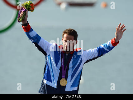 Vela olimpica, azione durante il London 2012 Giochi Olimpici a Weymouth e Portland Venue, Dorset, Gran Bretagna, UK. Medaglia d'oro nella classe Finn Ben Ainslie August 5th, 2012 foto: Dorset Servizio media Foto Stock