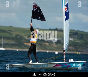 Vela olimpica, azione durante il London 2012 Giochi Olimpici a Weymouth e Portland Venue, Dorset, Gran Bretagna, UK. Tom Slingsby dell Australia celebra oro nella classe Laser August 6th, 2012 foto: Dorset Servizio media Foto Stock