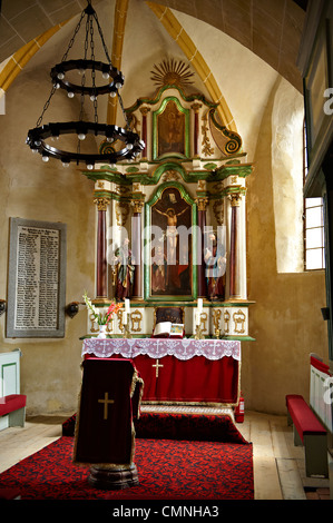 L'altare gotico del XIV secolo Axnte Sever chiesa fortificata, Transilvania. Foto Stock