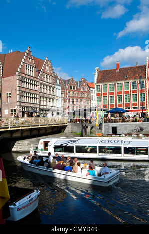 Belgio, Fiandre, Gand, turisti in gita barche sul fiume Leie Foto Stock