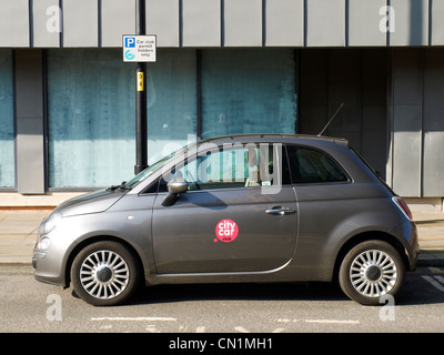 City car club il noleggio di ora in ora auto con proprio spazio parcheggio a Manchester REGNO UNITO Foto Stock